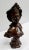Bronze bust with brown patina signed Meslais, representing and elegant damsel wearing a hat over her wavy hair. Her air...