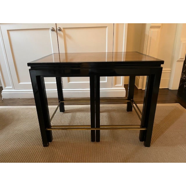 Authentic Edward Wormley for Dunbar occasional tables comprising a three-piece nesting set together with an additional...