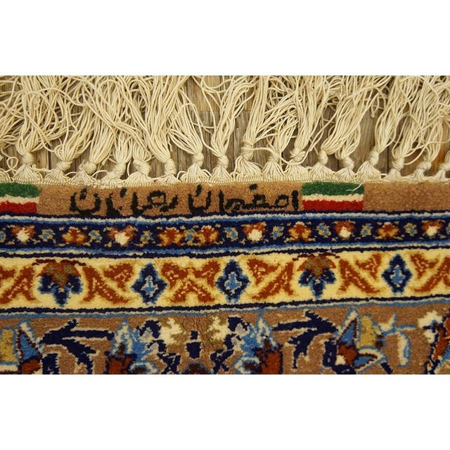 A 1940s vintage Isfahan rug, The piece measures approximately 3’6″ × 5’9″ (per the seller listing). The composition...