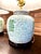 Illuminate your home with a touch of classic Chinoiserie charm. This stunning pair of vintage 1960’s Celadon ginger jar...