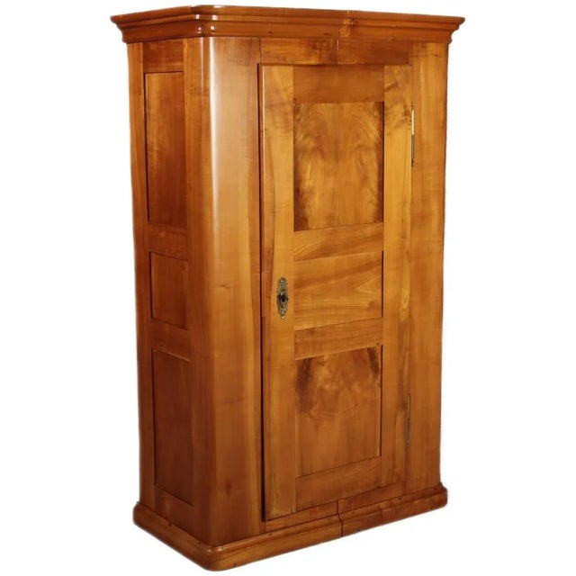Age and Origin: The wardrobe probably dates from around 1930 and is likely from Southern Germany. Dimensions: Height...