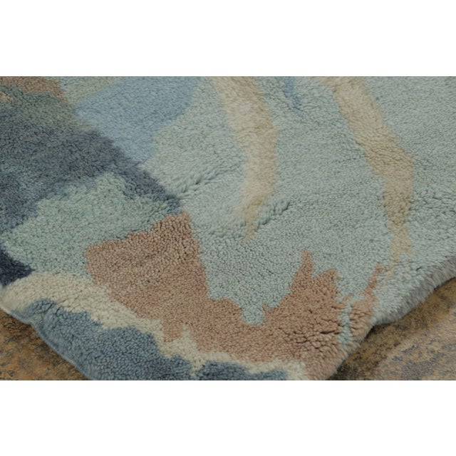 Hand-knotted in wool, this pair of 3x3 square rugs from France are an exceptionally rare 1925 French Art Deco rug by Jean...