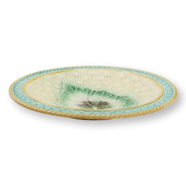 Late 19th century majolica dish featuring a naturalistic begonia leaf set against a basket weave ground with turquoise...