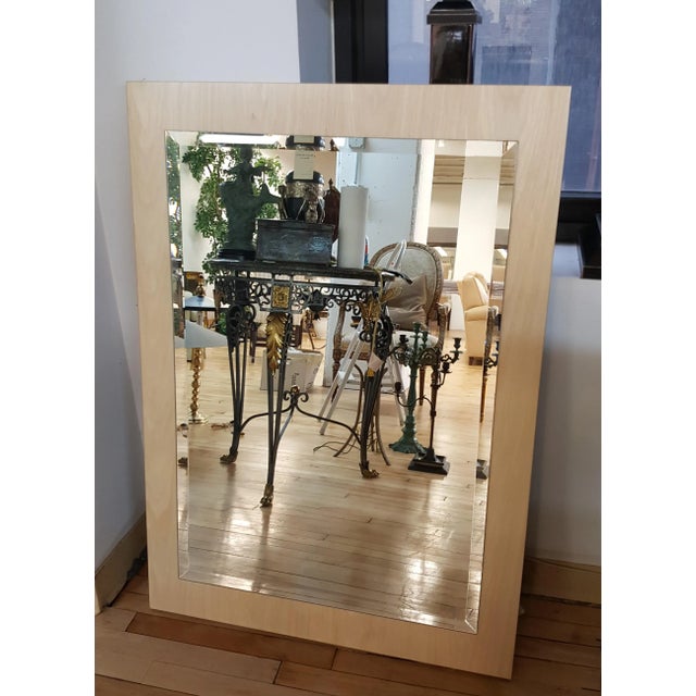 Large wall mirror with light colored wood. Beveled glass. This one is heavy. Floor sample in a showroom by Lane. Original...