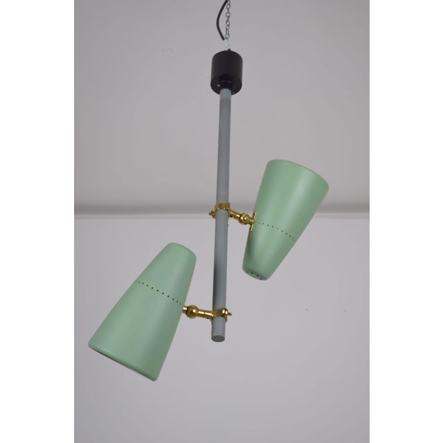 An elegant Italian-made Stilux chandelier, harking back to the modernist style of the 1950s and 1960s. The structure...