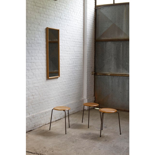 A original set of 3 early tripod Dot Stools by Fritz Hansen. In Teak molded plywood with it iconic copper dot rivets. All...