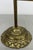 A decorative Vintage French fireplace set made from brass and offered in Good condition, featuring five pieces arranged on...
