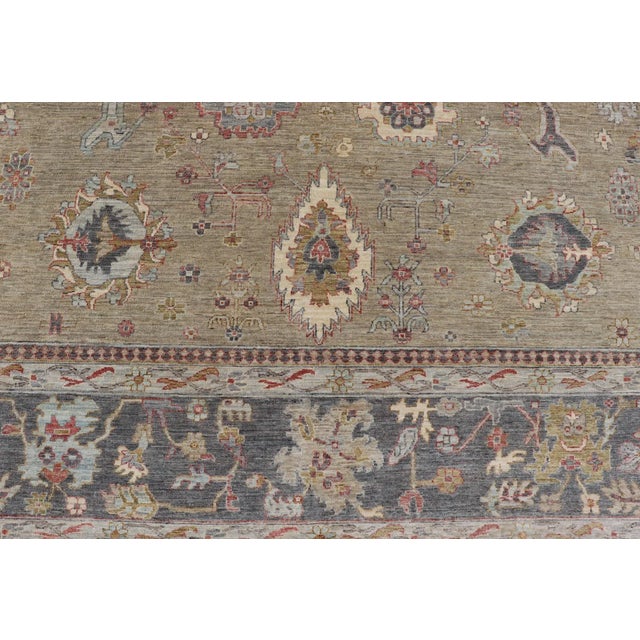 Large All-Over Designed Tabriz With a Yellow-Taupe Background and Muted Colors For Sale - Image 9 of 12