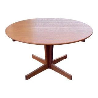 1960s Scandinavian Round-To-Oval Teak Split Pedestal Mid Century Modern Dining Table With Leaf For Sale