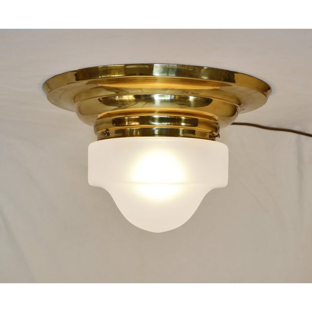 Art Nouveau Ceiling Lamp Art Nouveau ceiling lamp, circa 1915. Step-shaped brass body. Original frosted glass shade. The...