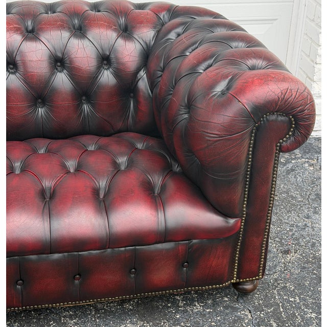 Pair of English Chesterfield Sofas in Burnished Burgundy Leather, Circa 1950s For Sale In Greensboro - Image 6 of 13