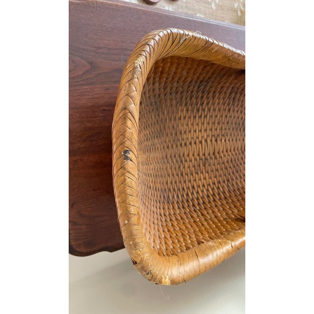 This large antique Chinese bentwood harvesting basket is a beautiful and functional piece of primitive art. Made of wood,...