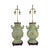 A pair of bronze chinoiserie lamps with verdigris patina, dragon handles and rosewood base. The hu form vessel lamp is a...