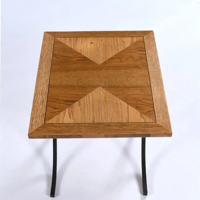 Pair of vintage Nineteen-Laties parquet oak side tables with elegant X shaped bases. The transitional side tables are a...