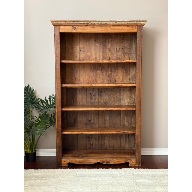 Reclaimed barn wood bookcase with incredible natural character and patina. This solid wood piece features rich texture,...