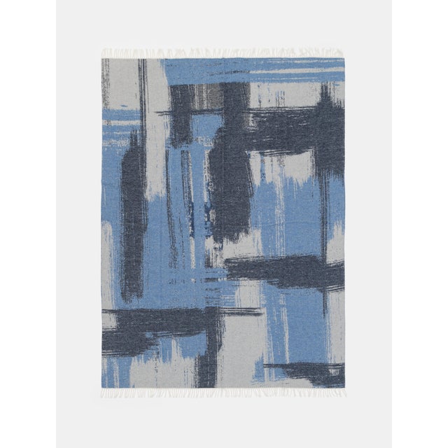 Jacquard wool and cashmere blanket with brushstroke motif from the Villa Como Collection.