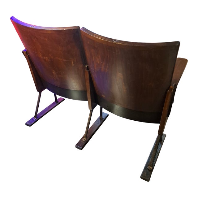 A combination of history and design, this pair of 1960s wooden cinema chairs, restored and in excellent condition,...