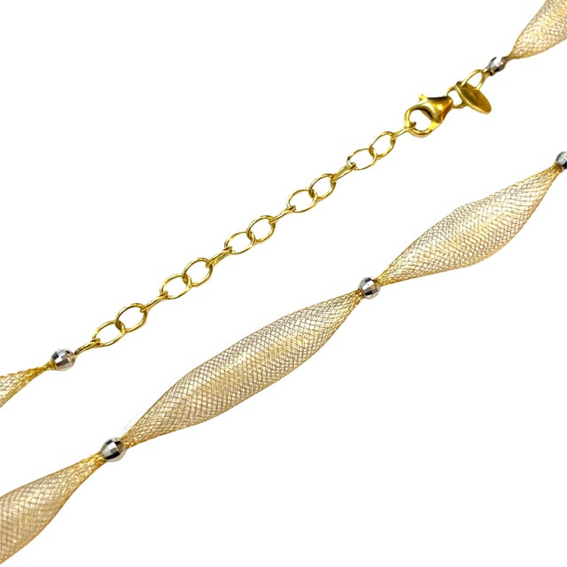 Elegant estate 14K two-tone gold Splendori necklace featuring alternating yellow gold mesh links accented with white gold...