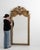 A mirror whose gold gilt ornate carved scrollwork gives it real character at first glance. The piece dates to 1880s,...