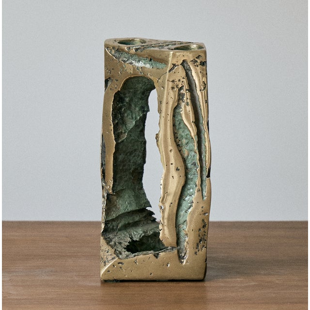 Brutalist solid bronze double candle holder. This pieces features two (2) openings for candlesticks on a heavily textured...