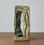 Brutalist solid bronze double candle holder. This pieces features two (2) openings for candlesticks on a heavily textured...