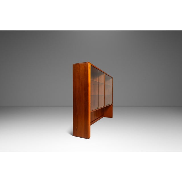 Introducing a stately display cabinet designed and crafted by the lauded D-Scan group in the early 1980s. Constructed from...