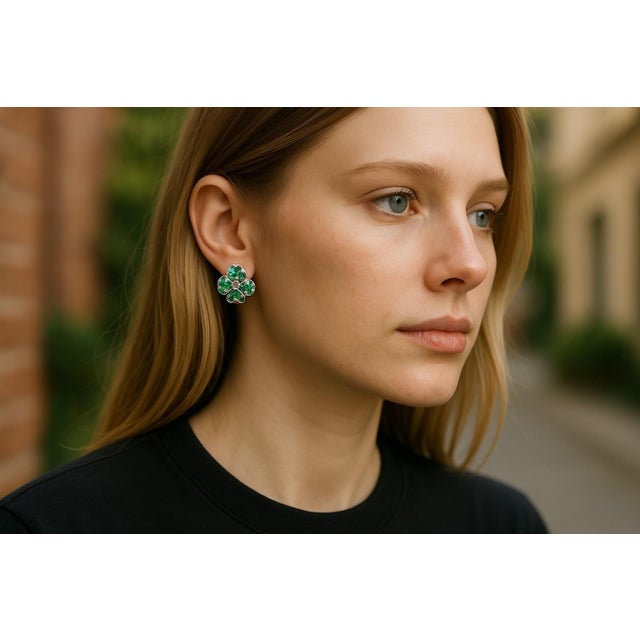 Introducing the exquisite Emerald, weighing 2.95 carat,and Diamond, weighing 0.35 carat, Floral Clip-on Earrings, a true...