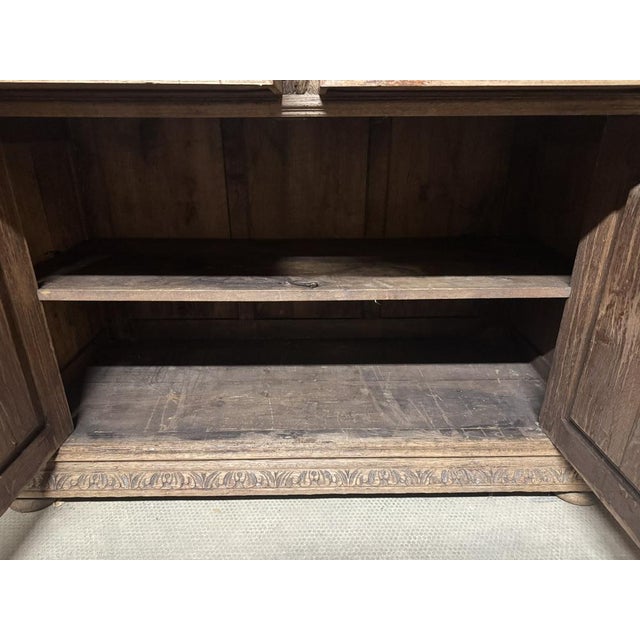 A superb French Carved Oak Hunting Cabinet, dating to the mid 19th Century. Adorned with wonderful carvings including 2...