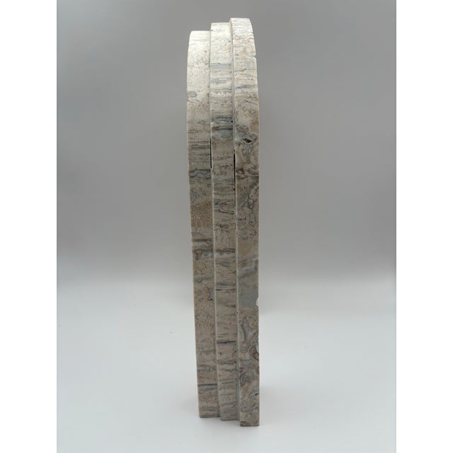 Classical travertine sculptural 12” high arch constructed of solid travertine. This understated minimal design creates...
