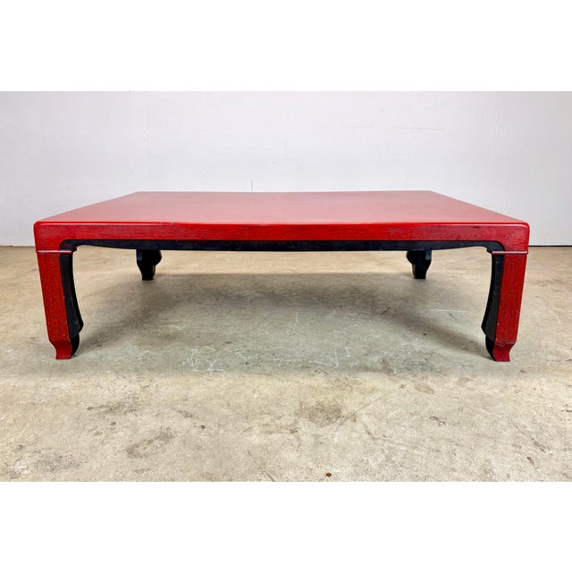 A stunning mid 20th century Japanese low tea / coffee table in rich red and black lacquer. Surface has a slight texture...