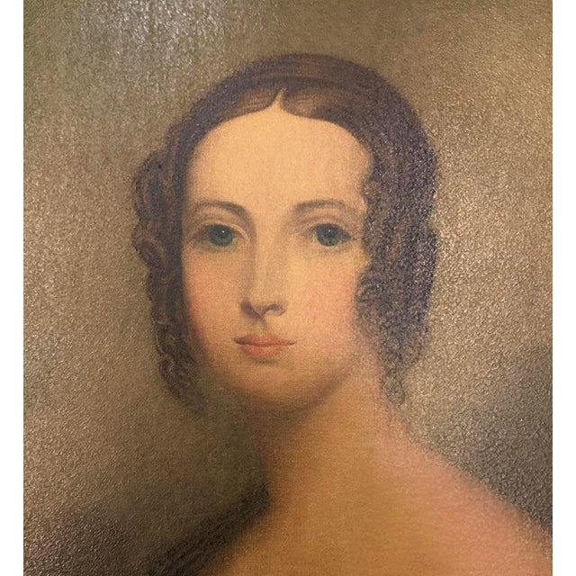 A lovely, vintage framed portrait print. Features a reproduction print of a portrait title "Unknown Portrait of a Lady"...