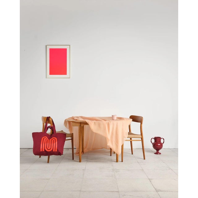 A beautifully shaped, round, extendable dining table made of solid oak, designed by hans j. Wegner and presumably...