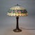 Antique Handel Bronze Table Lamp with Unique Floral Leaded Glass Shade C1930 Measures- 22.75"H x 17.75"W x 17.75"D