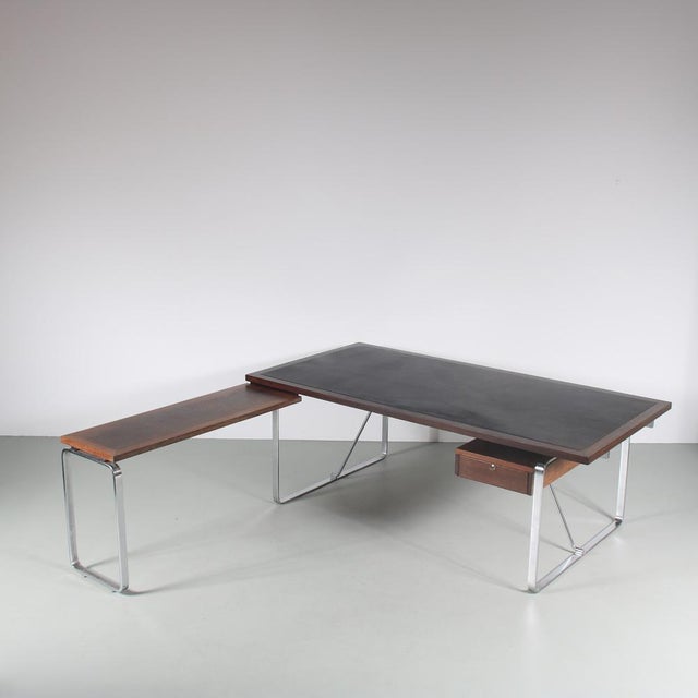 A luxurious, L-shaped desk designed by executive desk designed by Jorgen Lund & Ole Larsen, manufactured by Bo-ex in...