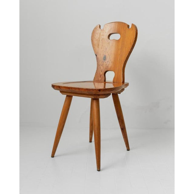 This vintage set of 3 wooden farmhouse chairs from the 1960s is a charming example of solid wood folk design. Crafted with...