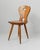 This vintage set of 3 wooden farmhouse chairs from the 1960s is a charming example of solid wood folk design. Crafted with...