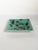 Decorative French ceramic ashtray dating from the 1970s. The rectangular form features a vibrant green glazed interior...