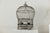 "About the Item Shaped like a hot air balloon in miniature, this antique brass bird cage floats between function and...