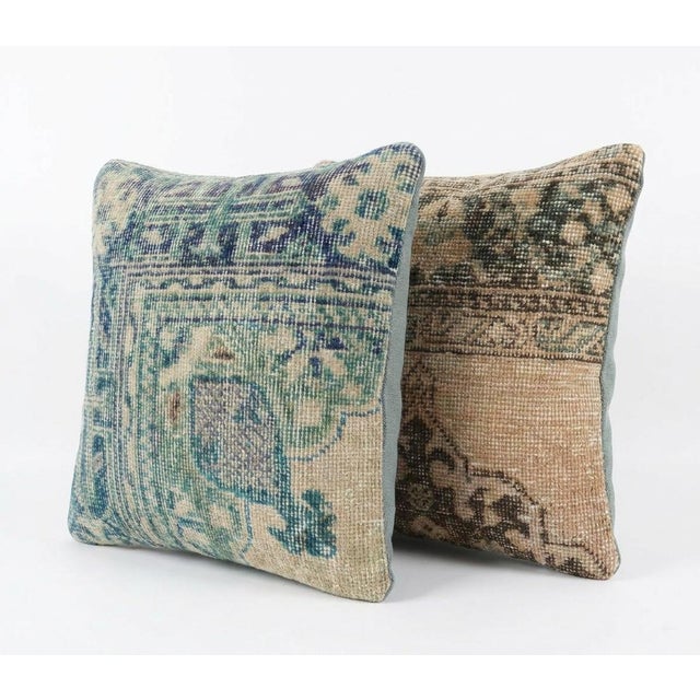 This beautiful 16'' x 16'' pillow cover set was made from authentic Turkish rug pieces. Bright colors of wool adorn the...