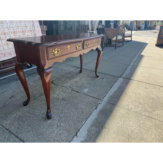 Beautiful Pennsylvania House console table, Cherry Wood, excellent condition with minor wear from use. Very nice brass...