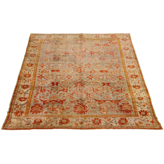 This Turkish Oushak rug is truly one-of-a-kind! Hand-knotted with soft wool, it boasts a stunning gray color field that...