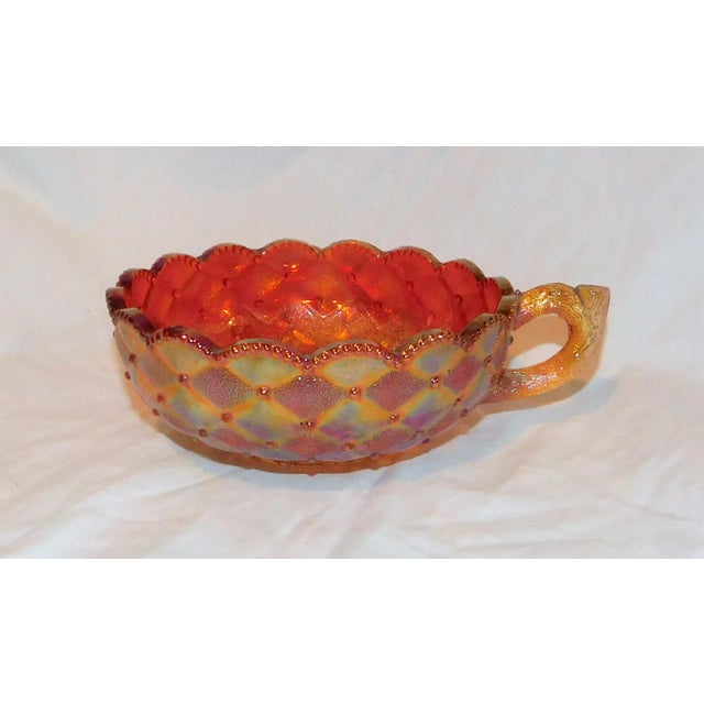 Gorgeous Marigold Carnival glass bonbon dish with quilted diamond patterning to outside and violets to the interior