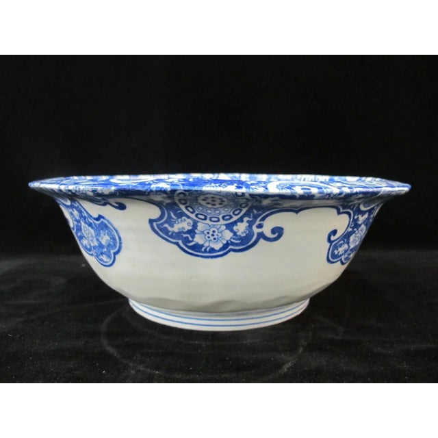 Large Chinese porcelain bowl in white with hand painted cobalt blue bird and floral design. Excellent condition, no chips,...