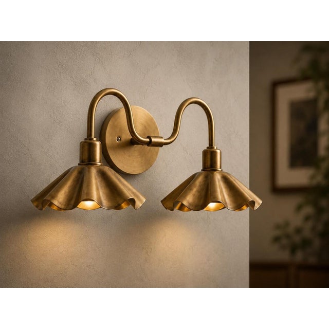 Handcrafted Solid Brass 2-Light Vanity Sconce with Scalloped Shades Bring warmth and character to your bathroom, bedroom,...