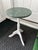 Elegant small pedestal table featuring a beautiful green marble top paired with a classic white pedestal base. This...