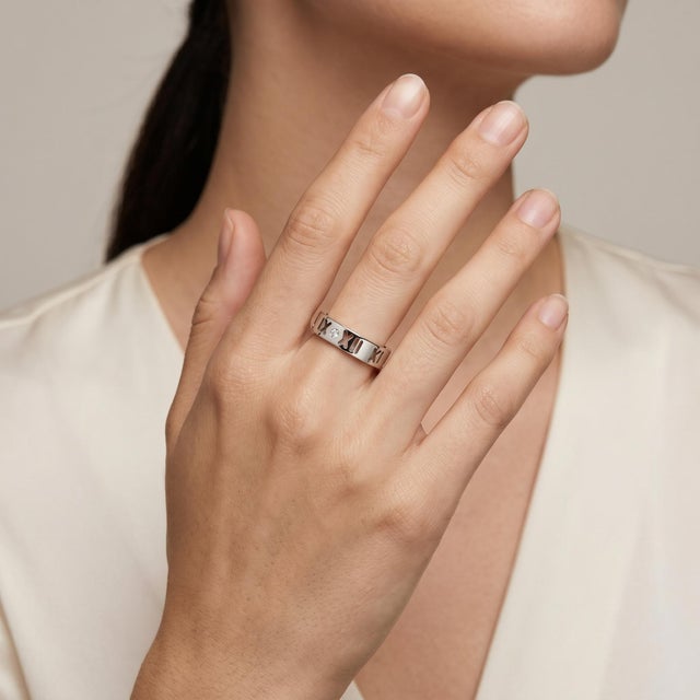Elevate your jewelry collection with this exquisite Vintage Ring from Tiffany & Co.'s Atlas Collection, featuring a...
