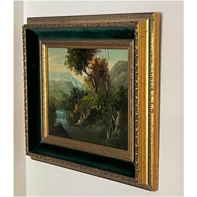 Decorative European landscape oil painting depicting a wooded river scene with cascade, painted in a traditional academic...