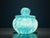 This Murano glass vanity set, featuring a submerged and bullicante design, is vintage from the 1970s. It features an...