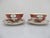 A stunning pair of Japanese Imari porcelain cups/bowls with matching saucers. Crafted from fine white porcelain, each...
