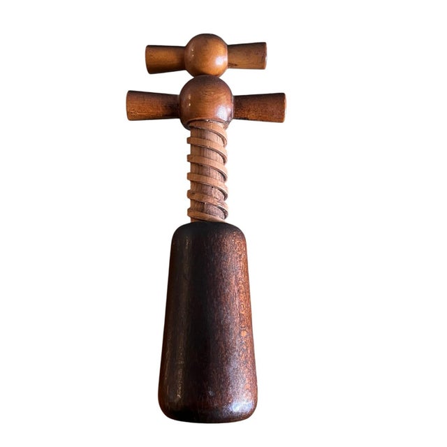 This is a vintage bottle opener from the mid to late 20th century. It has a double-handle design. Excellent working...